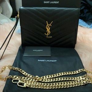 SOLD      YSL MONOGRAM CLUTCH